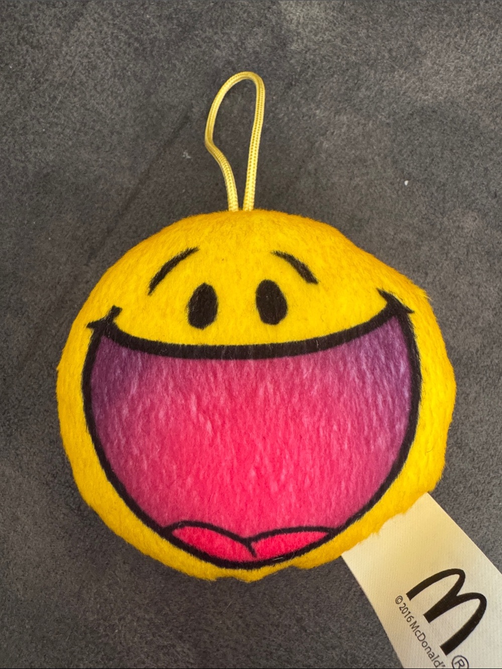 McDonald's Yellow Smiley Plush Hanging Face Ornament with Pink Mouth